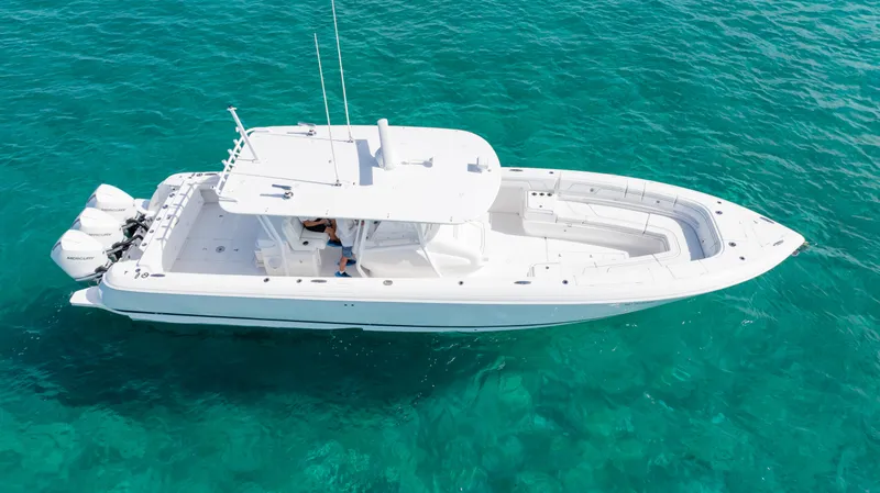  Yacht Photos Pics 2019 Intrepid 400 Center Console boat on clear turquoise water.