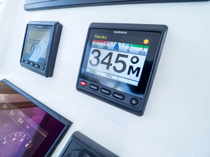  Yacht Photos Pics Garmin navigation display on 2019 Intrepid 400 Center Console boat dashboard.