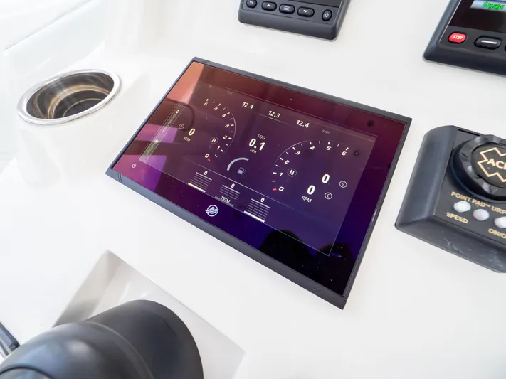  Yacht Photos Pics Control panel of 2019 Intrepid 400 Center Console boat with digital display and controls.