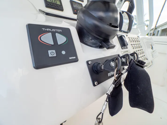  Yacht Photos Pics Control panel of a 2019 Intrepid 400 Center Console boat with thruster controls.