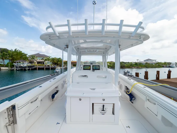  Yacht Photos Pics 2019 Intrepid 400 Center Console boat docked, showcasing spacious deck and modern design.