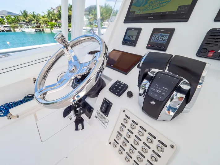 Yacht Photos Pics 2019 Intrepid 400 Center Console helm with modern controls and navigation displays.