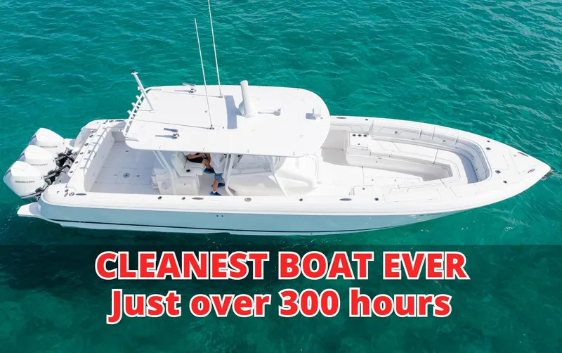  Yacht Photos Pics 2019 Intrepid 400 Center Console boat on clear water, labeled "Cleanest Boat Ever, Just over 300 hours."