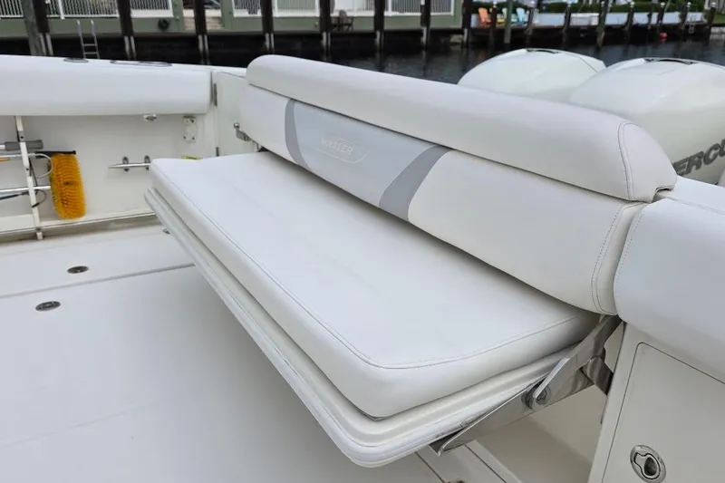  Yacht Photos Pics 2016 Boston Whaler 370 Outrage boat with foldable white seating.