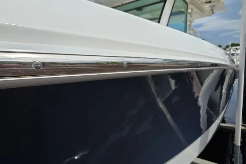  Yacht Photos Pics 2016 Boston Whaler 370 Outrage boat, sleek design with polished chrome detailing.