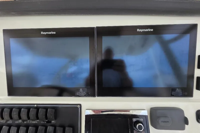  Yacht Photos Pics Control panel of 2016 Boston Whaler 370 Outrage with dual Raymarine displays.