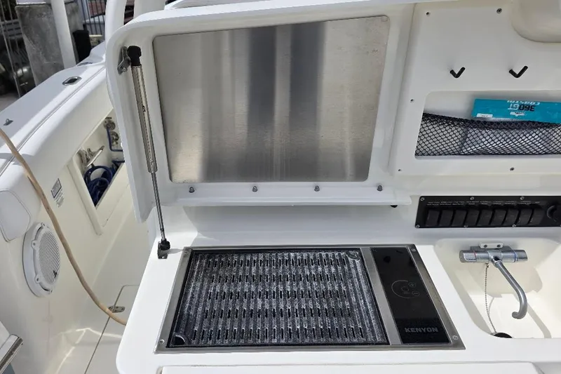  Yacht Photos Pics 2016 Boston Whaler 370 Outrage boat grill and control panel setup.