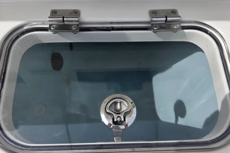  Yacht Photos Pics Hinged glass hatch on a 2016 Boston Whaler 370 Outrage boat.