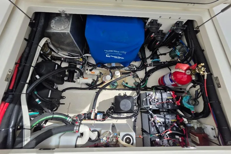  Yacht Photos Pics Engine compartment of a 2016 Boston Whaler 370 Outrage, featuring wiring and components.