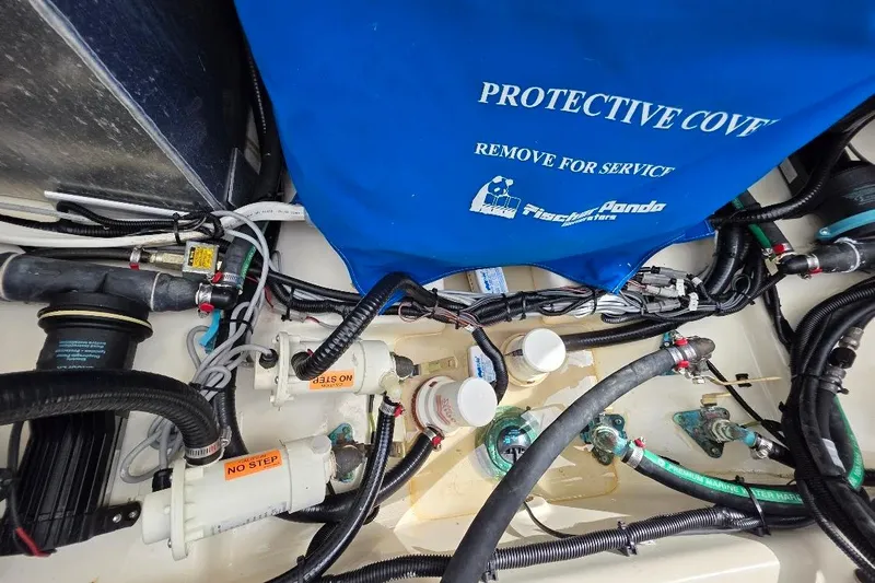  Yacht Photos Pics Engine compartment of a 2016 Boston Whaler 370 Outrage with protective cover and wiring.