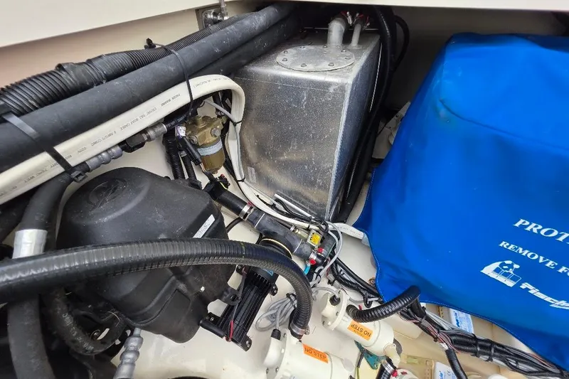  Yacht Photos Pics Engine compartment of a 2016 Boston Whaler 370 Outrage with visible components and wiring.
