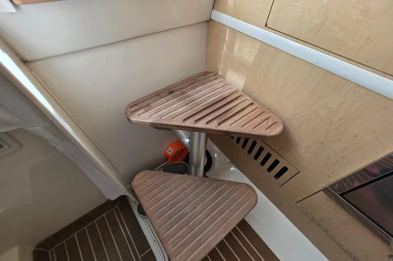  Yacht Photos Pics Interior wooden steps on a 2016 Boston Whaler 370 Outrage boat.