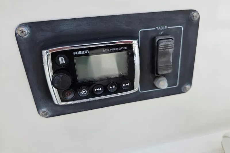  Yacht Photos Pics Control panel on 2016 Boston Whaler 370 Outrage with Fusion MS-NRX200i stereo.