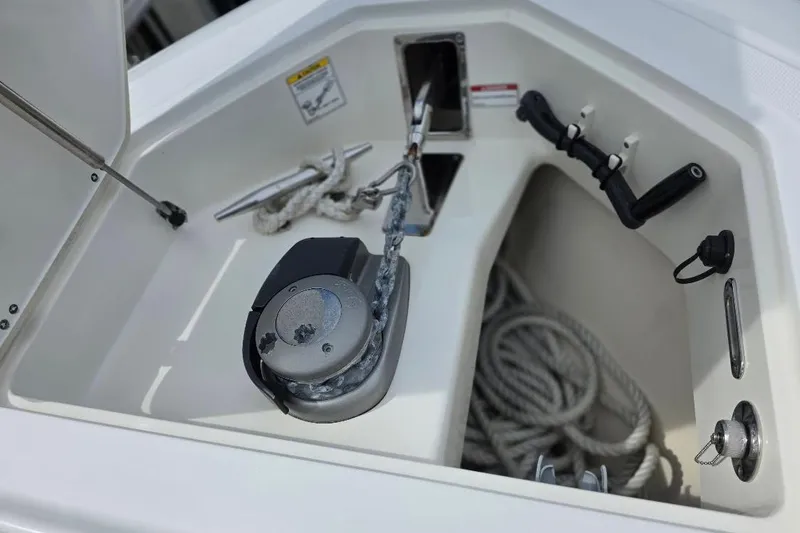  Yacht Photos Pics Anchor compartment of 2016 Boston Whaler 370 Outrage with ropes and equipment.