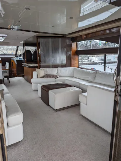  Yacht Photos Pics Luxurious interior of a 2010 Princess 72 Motor Yacht with white leather seating.