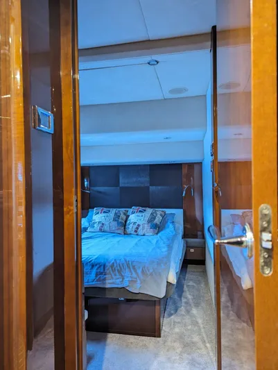  Yacht Photos Pics Luxurious bedroom interior of 2010 Princess 72 Motor Yacht with cozy bedding.