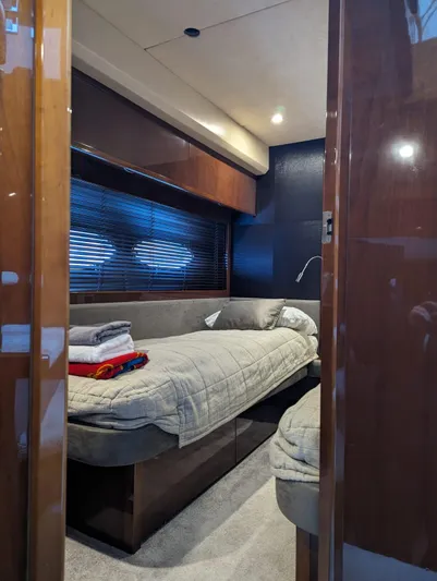  Yacht Photos Pics Interior cabin of 2010 Princess 72 Motor Yacht with cozy bed and modern design.