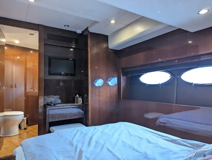  Yacht Photos Pics Luxurious interior of 2010 Princess 72 Motor Yacht with bedroom and ensuite bathroom.