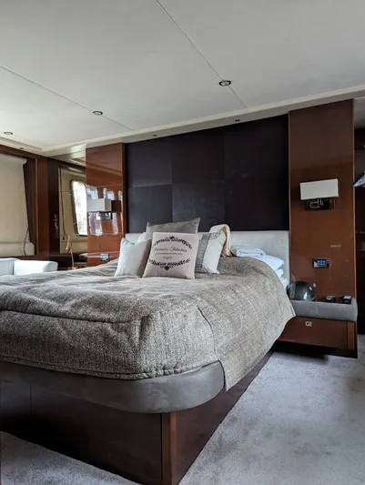  Yacht Photos Pics Luxurious bedroom interior of 2010 Princess 72 Motor Yacht with elegant bedding and modern decor.