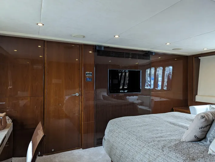  Yacht Photos Pics Luxurious interior of 2010 Princess 72 Motor Yacht with wood paneling and modern amenities.