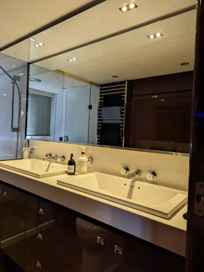  Yacht Photos Pics Luxurious bathroom in 2010 Princess 72 Motor Yacht with dual sinks and modern fixtures.