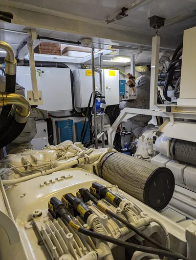  Yacht Photos Pics Engine room of a 2010 Princess 72 Motor Yacht, showcasing machinery and equipment.