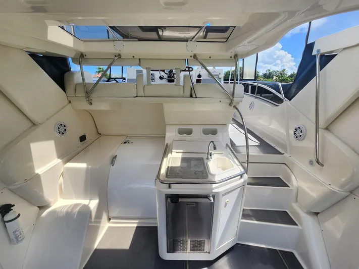  Yacht Photos Pics 2000 Silverton 442 Cockpit Motor Yacht interior with kitchenette and seating area.