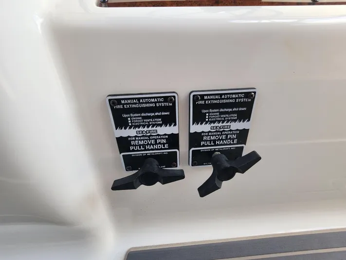  Yacht Photos Pics Fire extinguishing system controls on 2000 Silverton 442 Cockpit Motor Yacht.