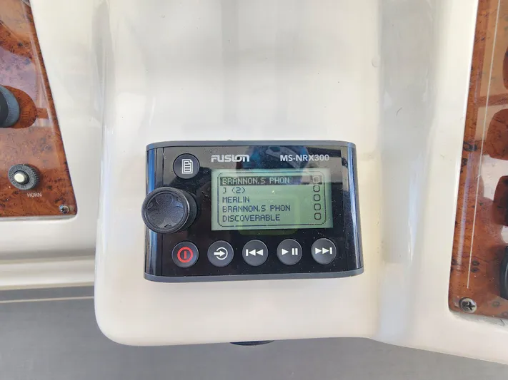  Yacht Photos Pics Fusion MS-NRX200 stereo on 2000 Silverton 442 Cockpit Motor Yacht dashboard.