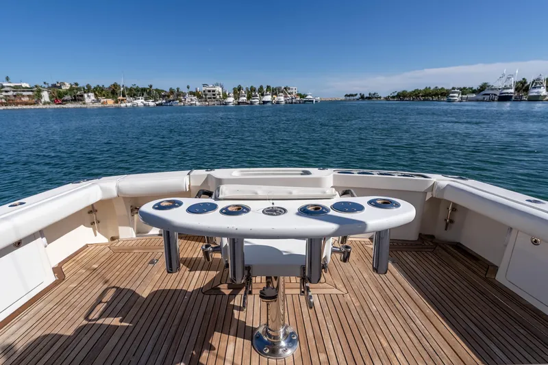  Yacht Photos Pics 2005 Cabo 40 Express yacht deck with scenic marina view.