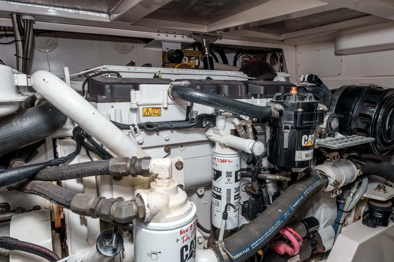 Yacht Photos Pics Engine room of a 2005 Cabo 40 Express boat, featuring Caterpillar components.