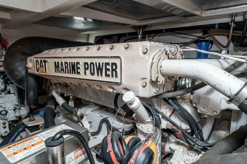  Yacht Photos Pics Engine room of 2005 Cabo 40 Express with CAT Marine Power engine.
