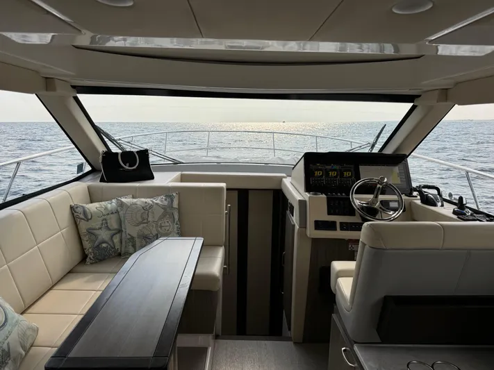 D'bauchery Yacht Photos Pics 2022 Regal 38XO- Helm