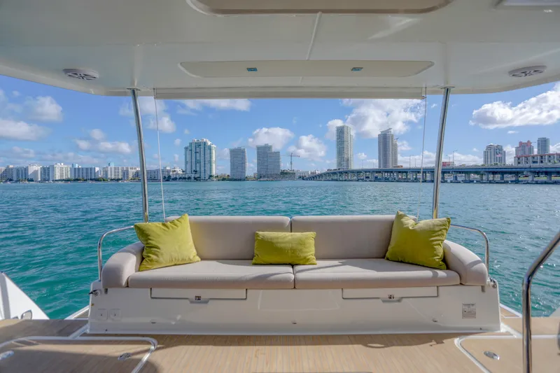 Hawkeye Yacht Photos Pics Luxurious 2022 Fountaine Pajot MY6 yacht with scenic city skyline view.