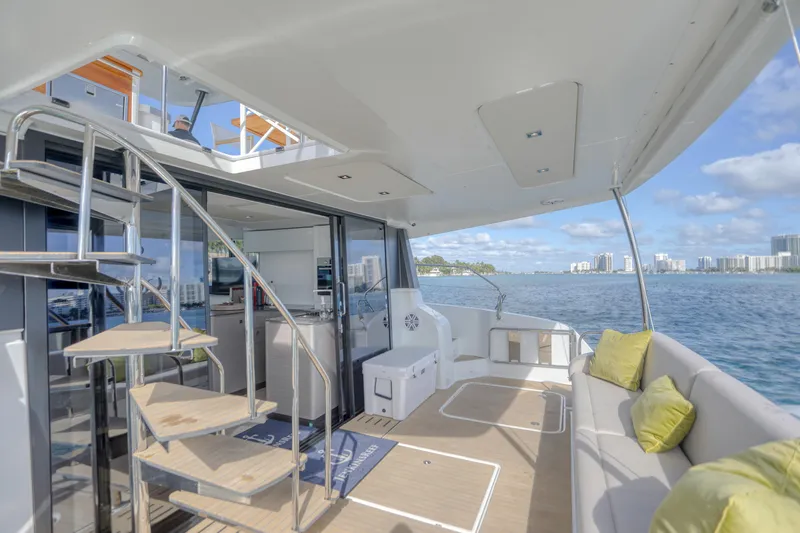 Hawkeye Yacht Photos Pics 2022 Fountaine Pajot MY6 yacht deck with modern seating and ocean view.