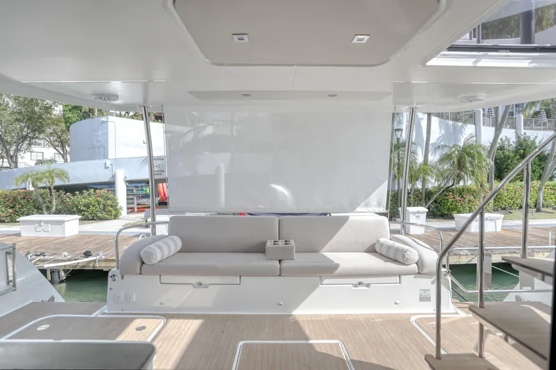 Hawkeye Yacht Photos Pics Luxurious 2022 Fountaine Pajot MY6 yacht interior with elegant seating and modern design.