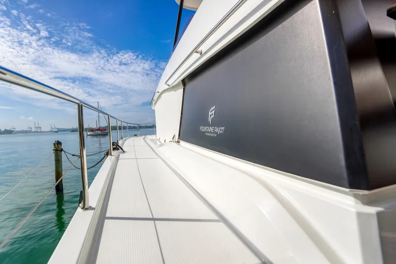 Hawkeye Yacht Photos Pics 2022 Fountaine Pajot MY6 yacht deck with ocean view and clear blue sky.