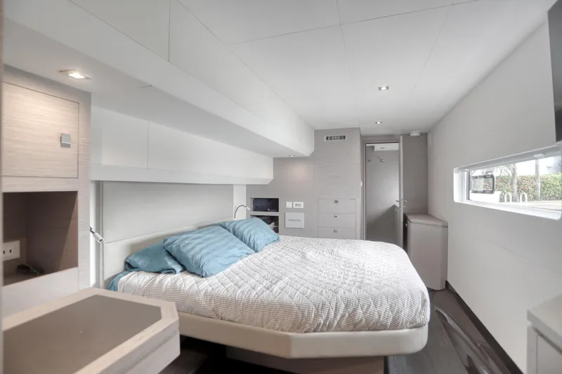 Hawkeye Yacht Photos Pics Luxurious bedroom interior of 2022 Fountaine Pajot MY6 yacht with modern design.