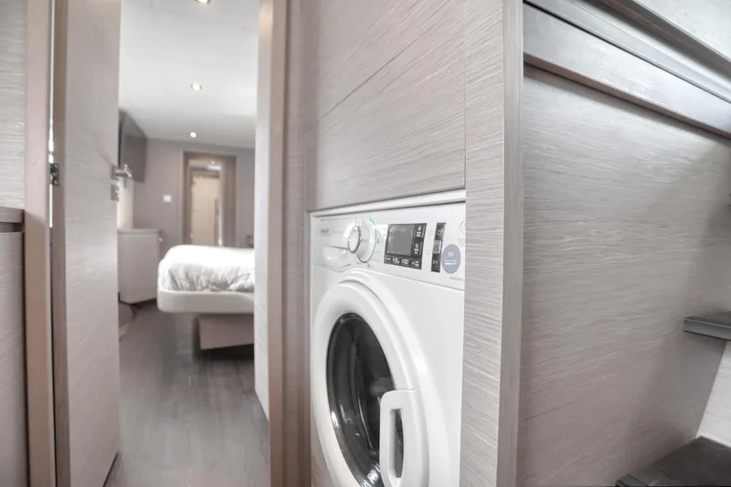 Hawkeye Yacht Photos Pics Interior of 2022 Fountaine Pajot MY6 yacht with washing machine and bedroom view.