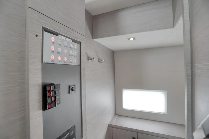 Hawkeye Yacht Photos Pics Control panel area inside 2022 Fountaine Pajot MY6 yacht, featuring modern design and lighting.