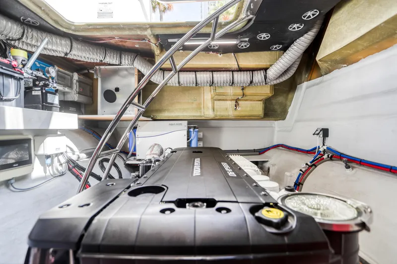 Hawkeye Yacht Photos Pics Engine room of 2022 Fountaine Pajot MY6 yacht, showcasing mechanical components and wiring.