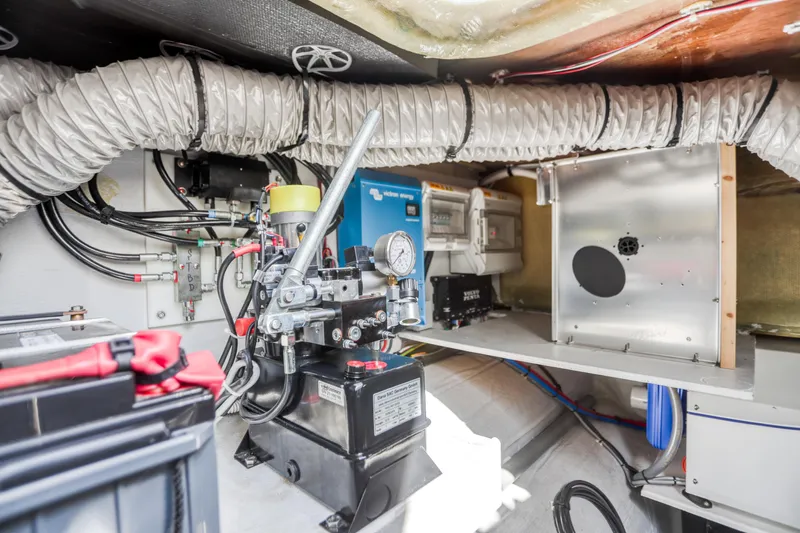 Hawkeye Yacht Photos Pics Engine room of 2022 Fountaine Pajot MY6 yacht with mechanical and electrical components.