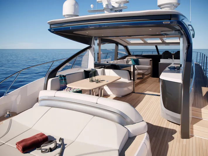  Yacht Photos Pics Luxurious 2025 Princess V55 Express yacht interior with elegant seating and ocean view.