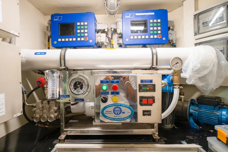 Astarte Yacht Photos Pics Engine room of 2007 Ferretti Yachts 830 with control panels and machinery.