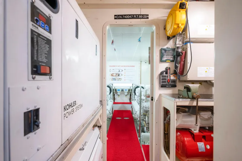 Astarte Yacht Photos Pics Engine room of 2007 Ferretti Yachts 830 with Kohler power system and red carpet.