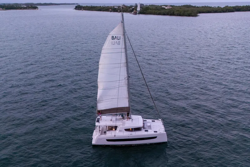 Point Clear Yacht Photos Pics Sailing catamaran Bali 4.4, 2023 model, cruising on open water.