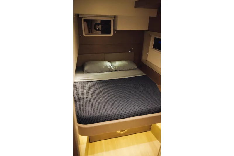 Point Clear Yacht Photos Pics Cozy cabin bedroom in 2023 Bali 4.4 yacht with modern bedding.