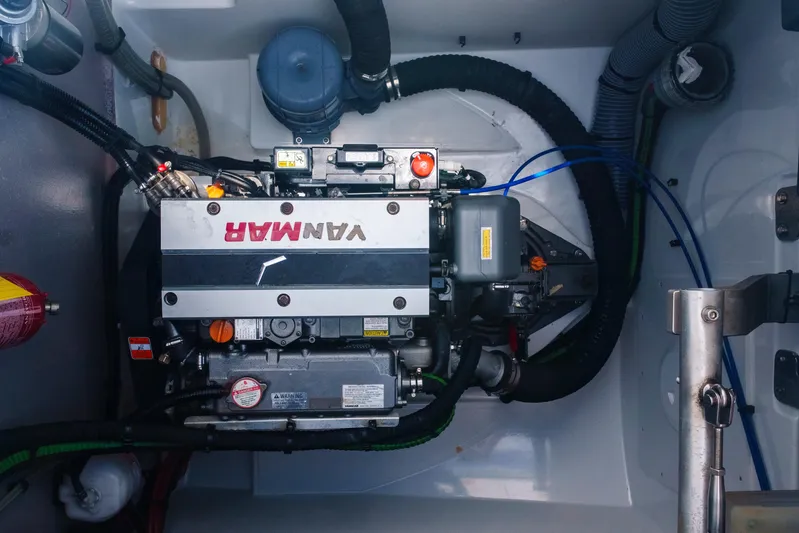Point Clear Yacht Photos Pics Engine compartment of a 2023 Bali 4.4 yacht, featuring a Yanmar engine.