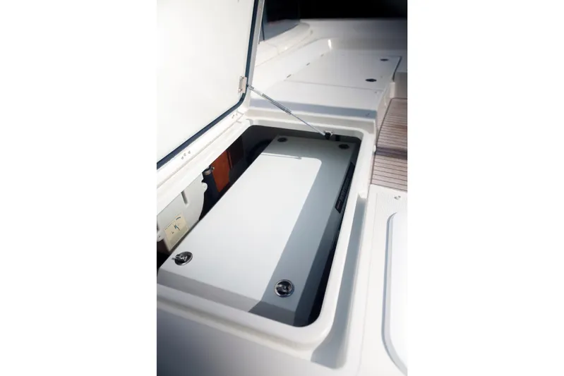 Point Clear Yacht Photos Pics Open storage compartment on 2023 Bali 4.4 yacht deck.