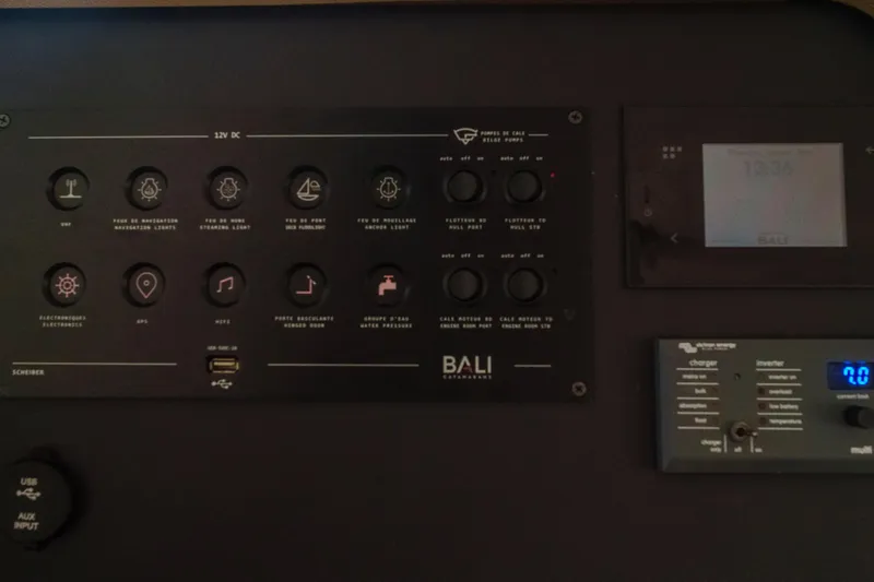 Point Clear Yacht Photos Pics Control panel of a 2023 Bali 4.4 catamaran with navigation and system controls.